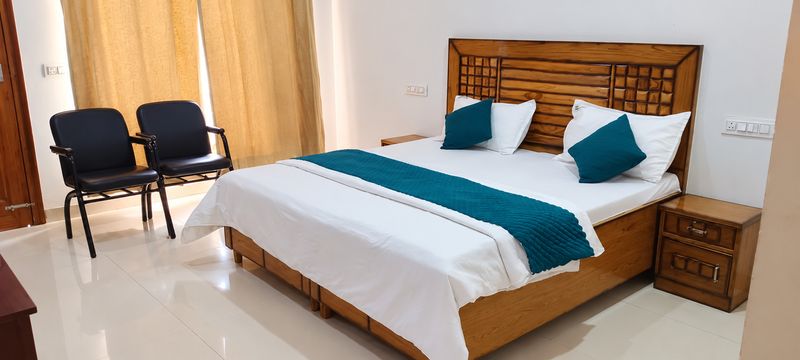 A room with a teal runner