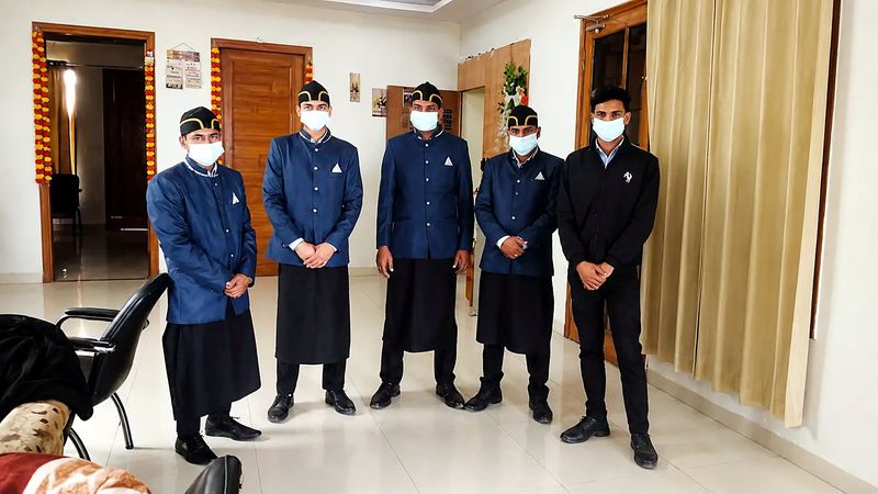 The BJ Villa event team in uniform at the house